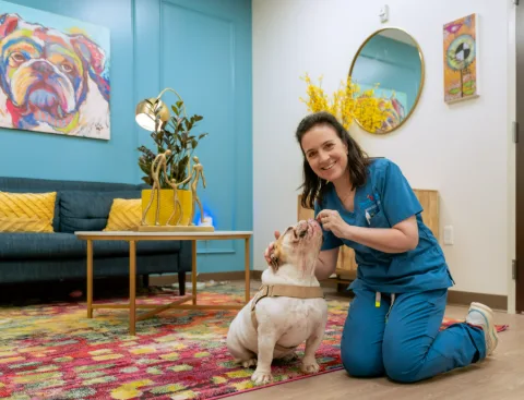 Dr. Aftab Guy with Georgy, the practice therapy dog