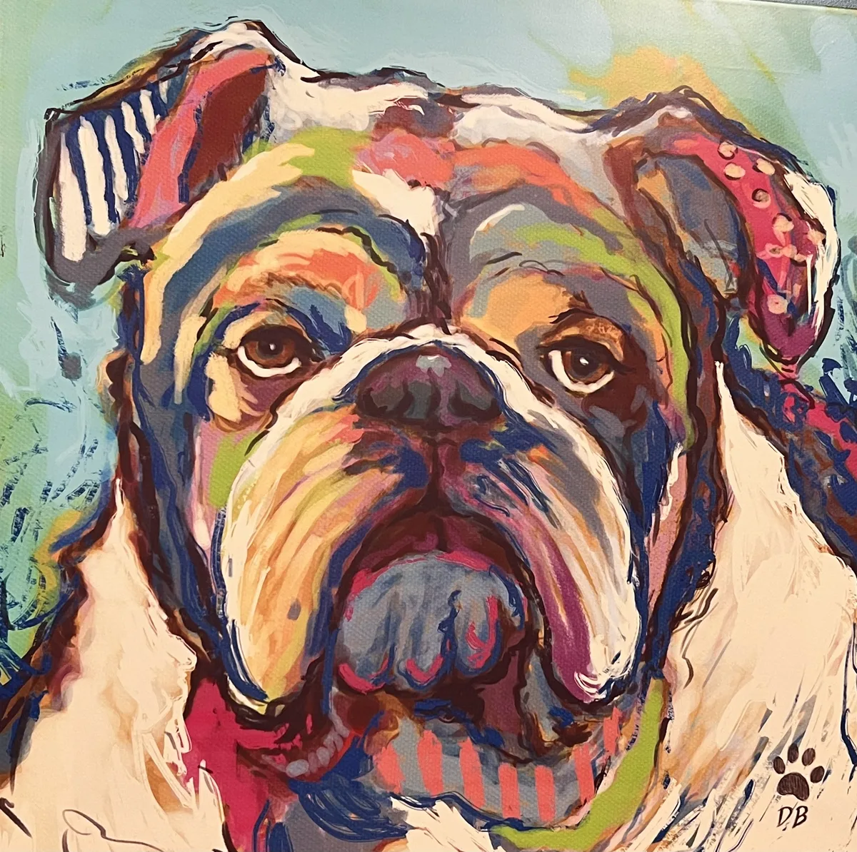 A colorful painted portrait of a bulldog on the practice wall