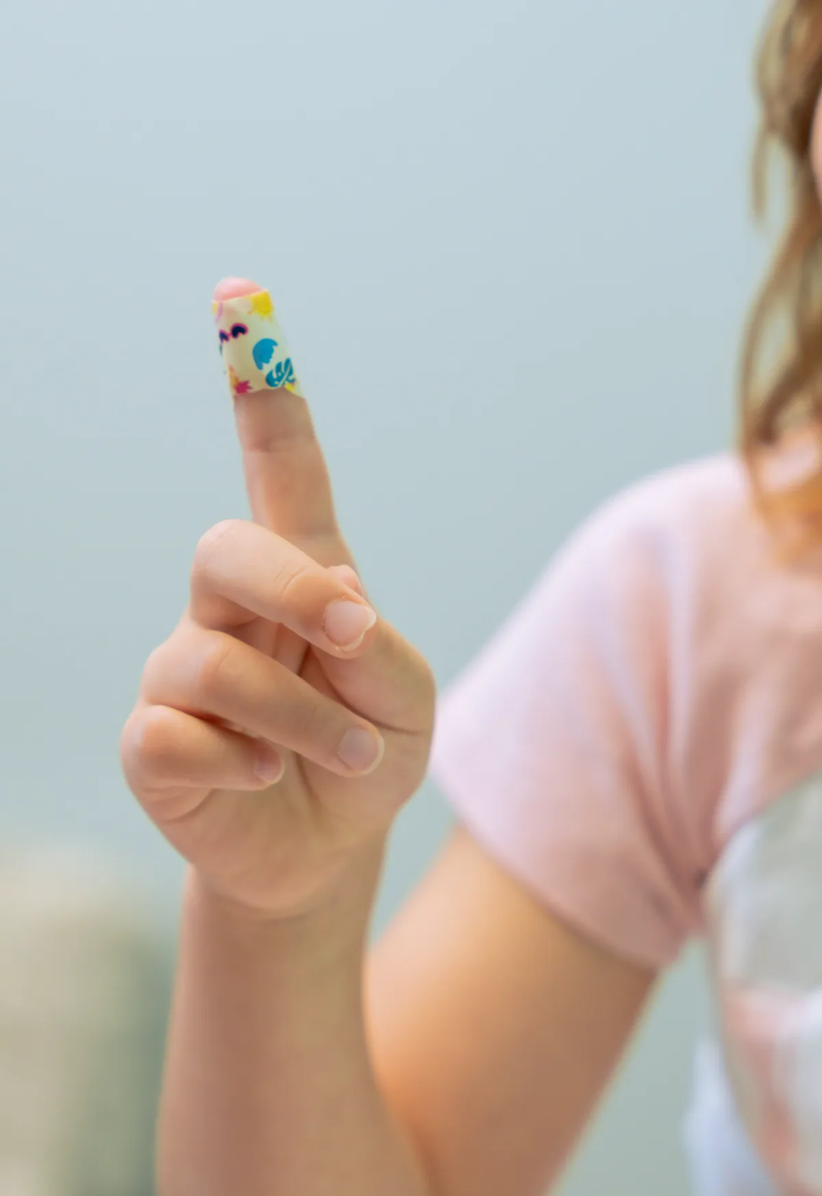 A young patient’s finger after a blood glucose check